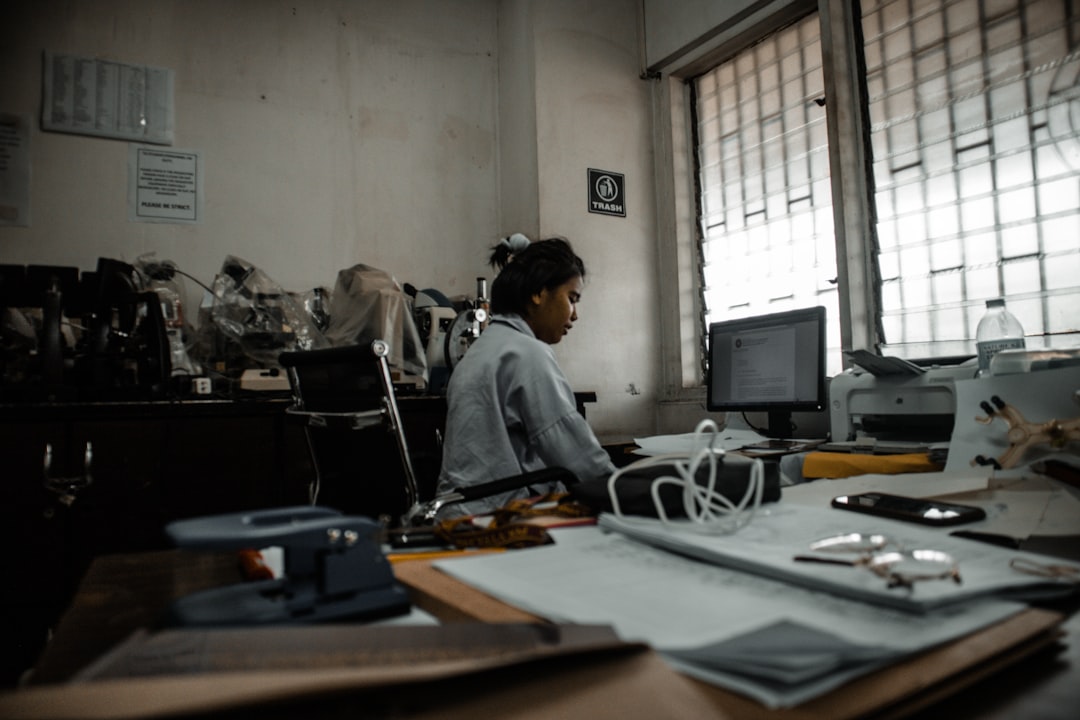 Person working at a computer representing a cybercrime complaint investigation
